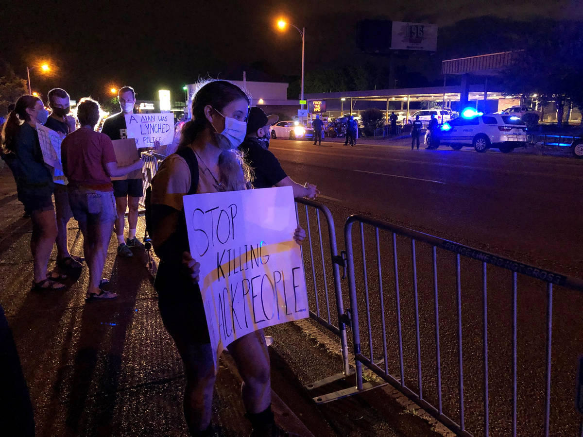 Protesters in Memphis, Tenn.. gather outside a police precinct Wednesday, May 27, 2020, to voic ...