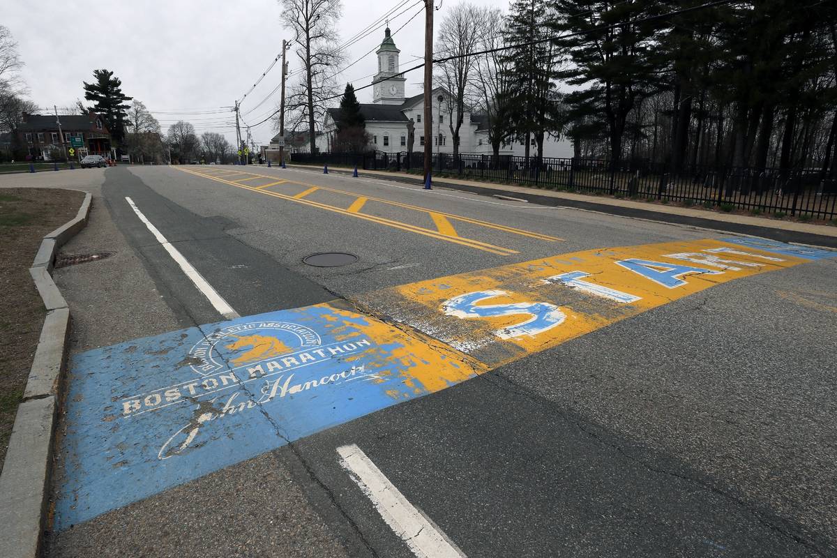In this Monday April 20, 2020 file photo, the Boston Marathon start line in Hopkinton, Mass., i ...