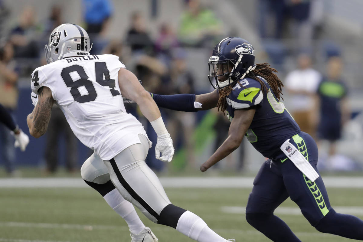 Seattle Seahawks linebacker Shaquem Griffin (49) pursues Oakland Raiders tight end Paul Butler ...