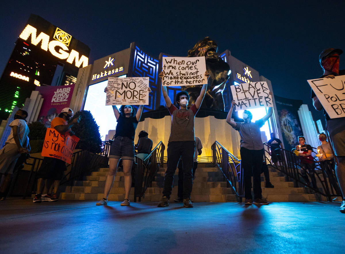 Demonstrators gather to demand justice for George Floyd along the Las Vegas Strip on Thursday, ...