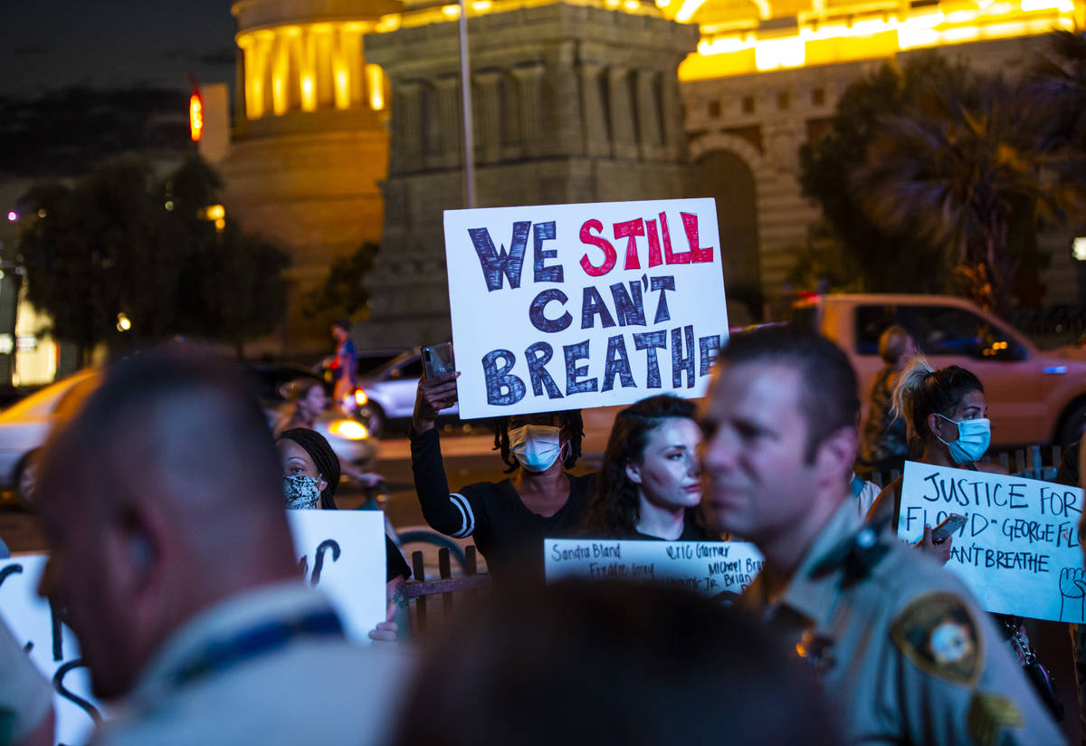 Demonstrators gather to demand justice for George Floyd along the Las Vegas Strip on Thursday, ...