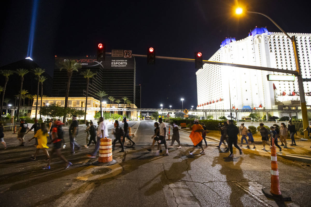 Demonstrators march to demand justice for George Floyd along the Las Vegas Strip on Thursday, M ...