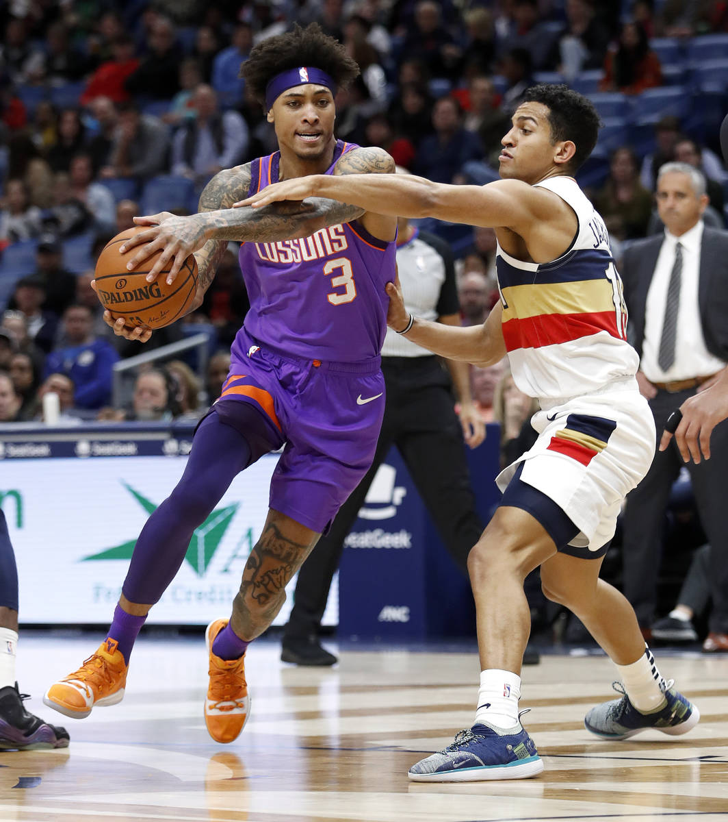Phoenix Suns forward Kelly Oubre Jr. (3) drives past New Orleans Pelicans guard Frank Jackson ( ...