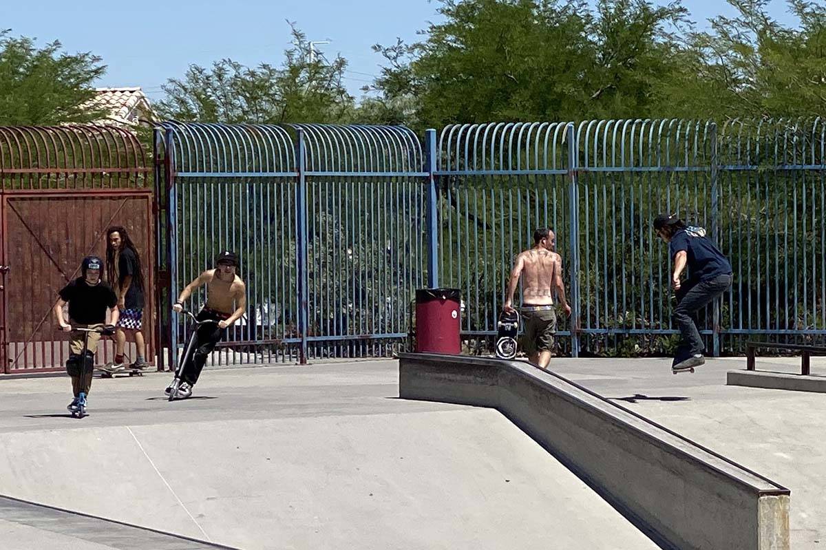 About two dozen people of all ages take advantage of Anthem Hills skatepark, which reopened on ...