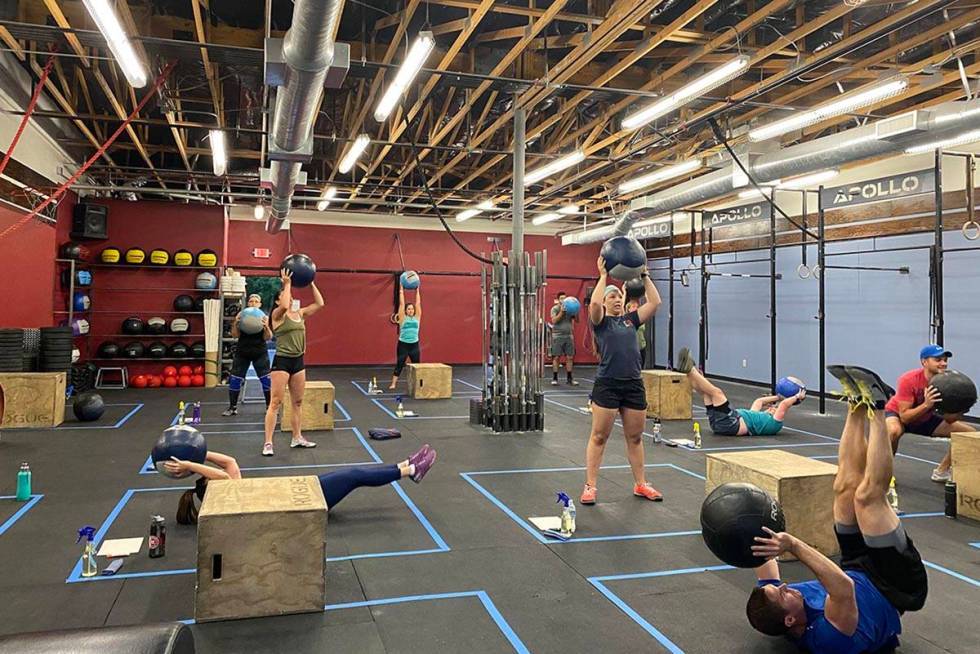 Attendees at CrossFit Apollo on North Buffalo Drive have been waiting more than two months to g ...