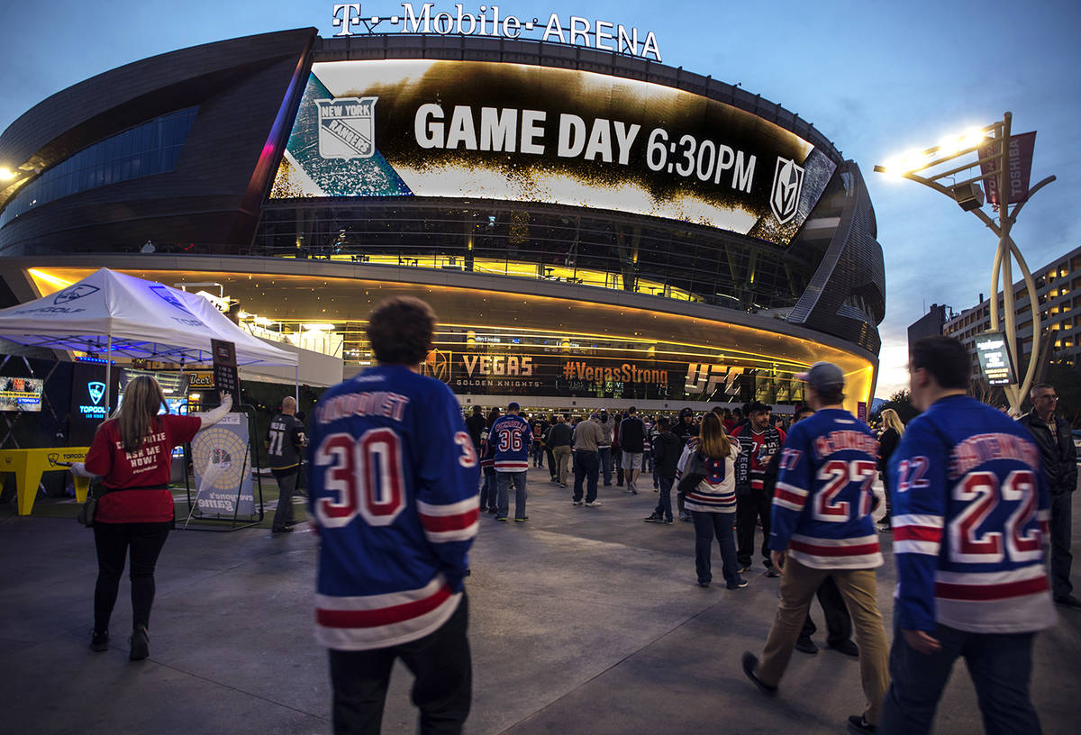 In this Jan. 7, 2018, file photo, New York Rangers fans arrive at T-Mobile Arena for an NHL hoc ...