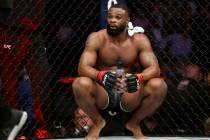 Tyron Woodley reacts after his fight against Kamaru Usman in the welterweight title bout during ...