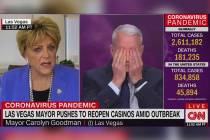 Anderson Cooper reacts during an interview with Las Vegas Mayor Carolyn Goodman during an inter ...