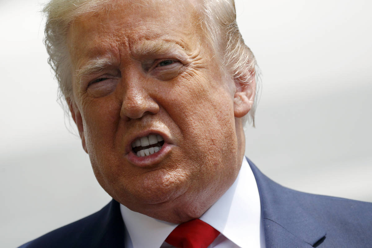 President Donald Trump speaks with members of the press on the South Lawn of the White House, S ...