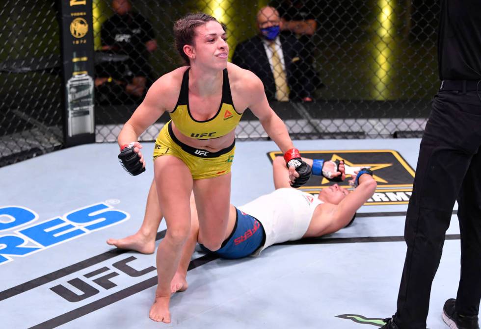 LAS VEGAS, NEVADA - MAY 30: Mackenzie Dern celebrates after her submission victory over Hannah ...