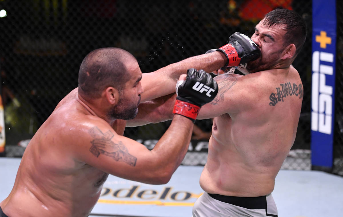 LAS VEGAS, NEVADA - MAY 30: (L-R) Blagoy Ivanov of Bulgaria punches Augusto Sakai of Brazil in ...