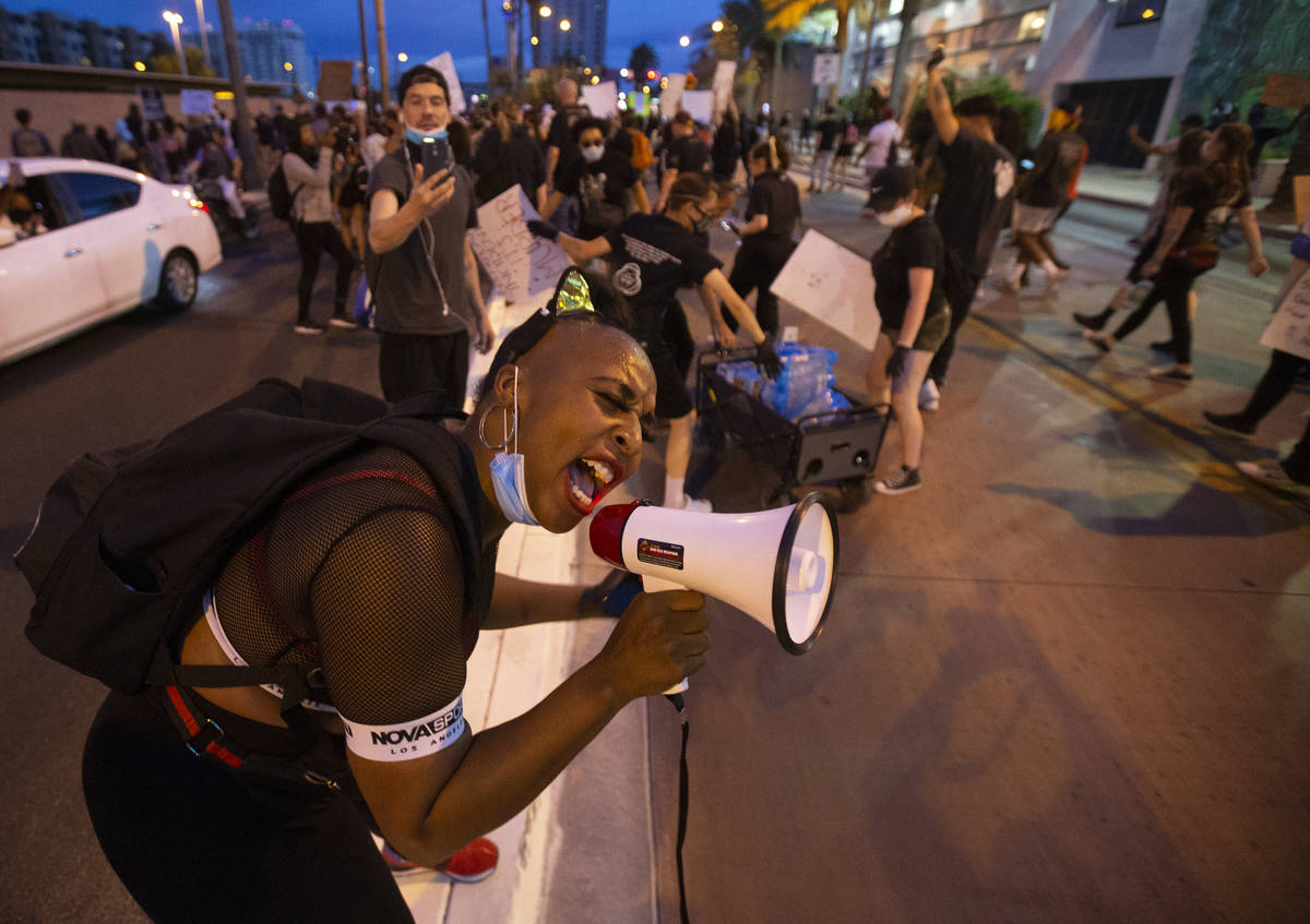 A large crowd protests in downtown Las Vegas during an event organized by Black Lives Matter on ...