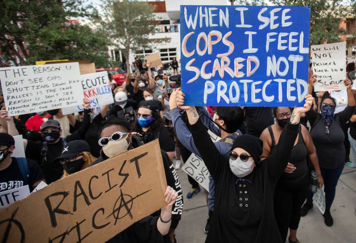A large crowd protests in downtown Las Vegas during an event organized by Black Lives Matter on ...