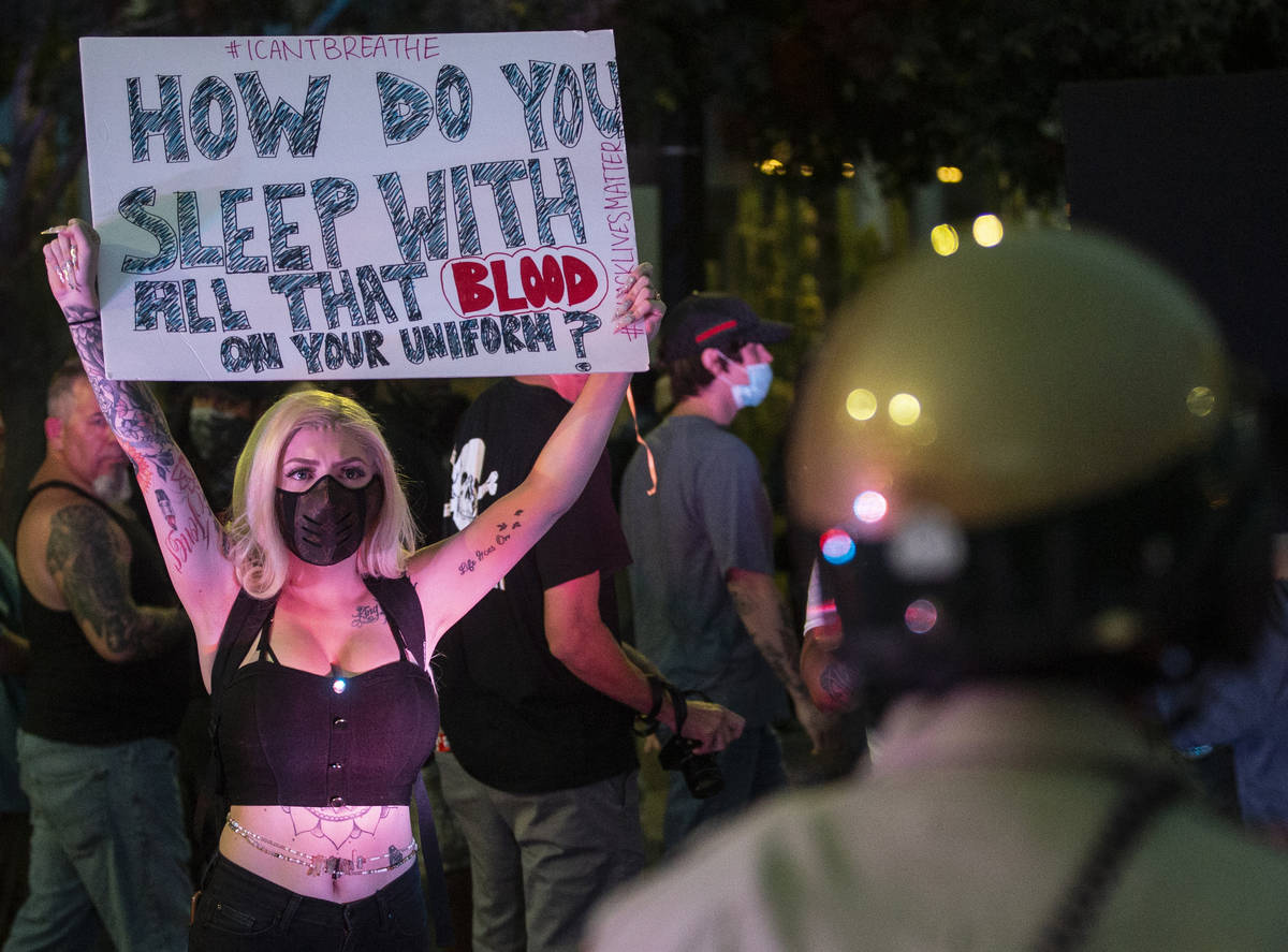 A large crowd protests in downtown Las Vegas during an event organized by Black Lives Matter on ...