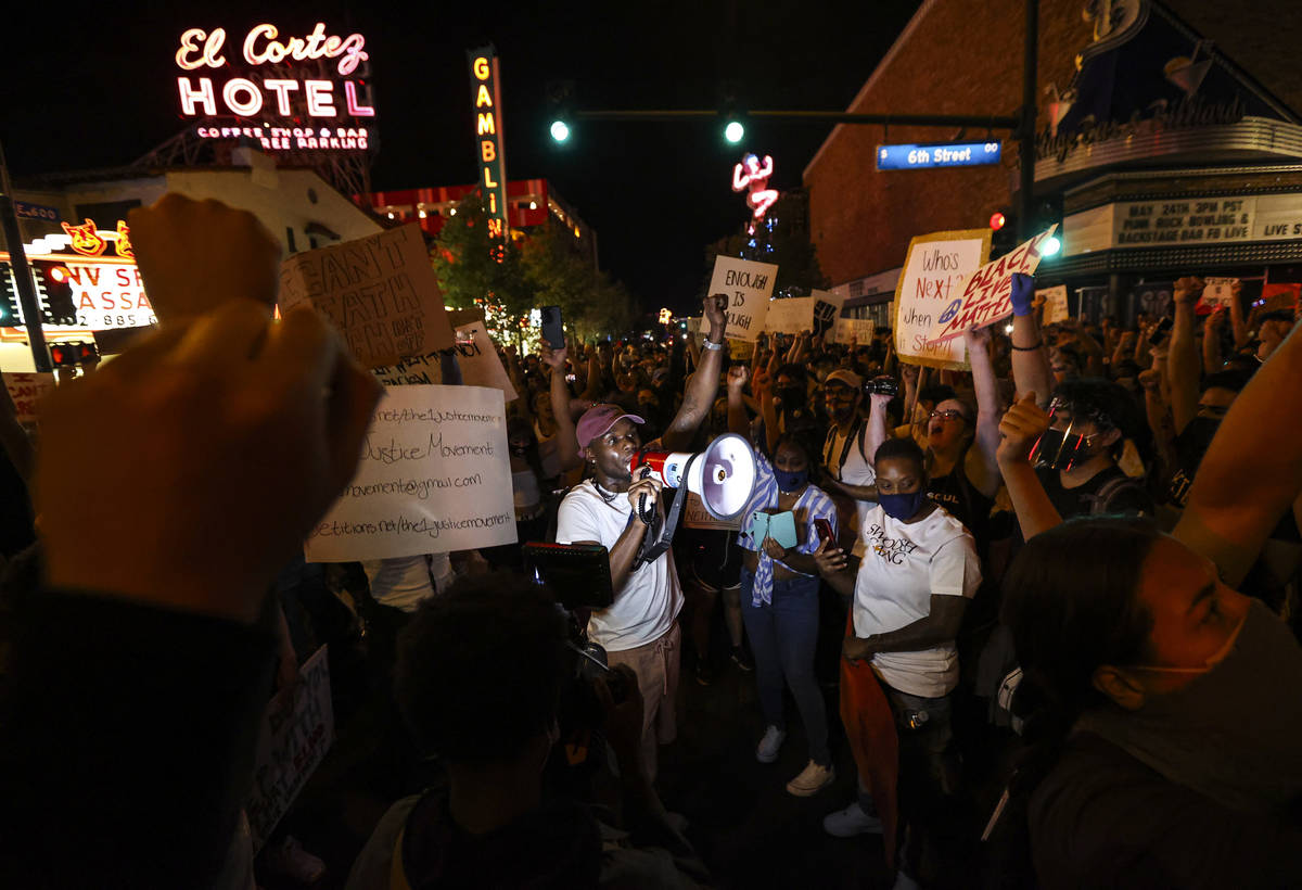 A man speaks as people protest the death of George Floyd in downtown Las Vegas on Saturday, May ...