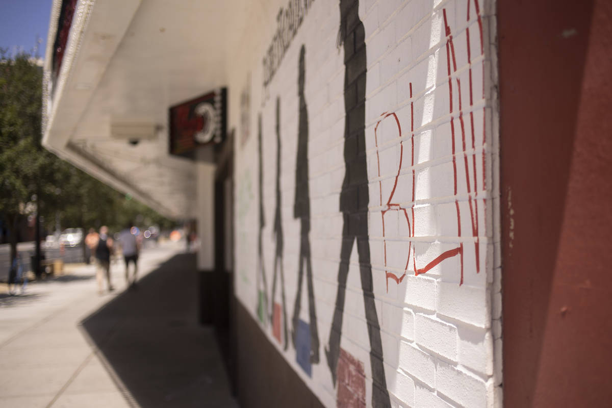 Black Lives Matter is abbreviated in graffiti on the El Cortez hotel-casino following a night o ...