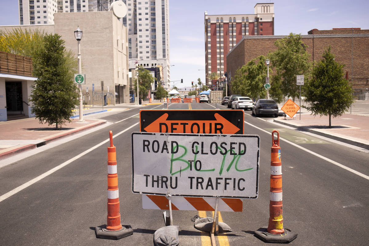 Black Lives Matter is abbreviated on a traffic sign downtown after a night of protests for Geor ...