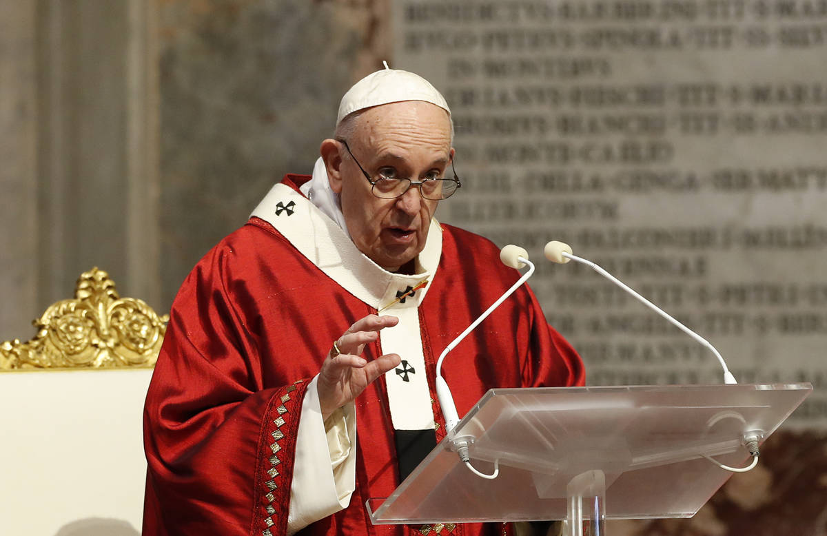Pope Francis celebrates Mass in St. Peter's Basilica at the Vatican, Sunday, May 31, 2020. Fran ...