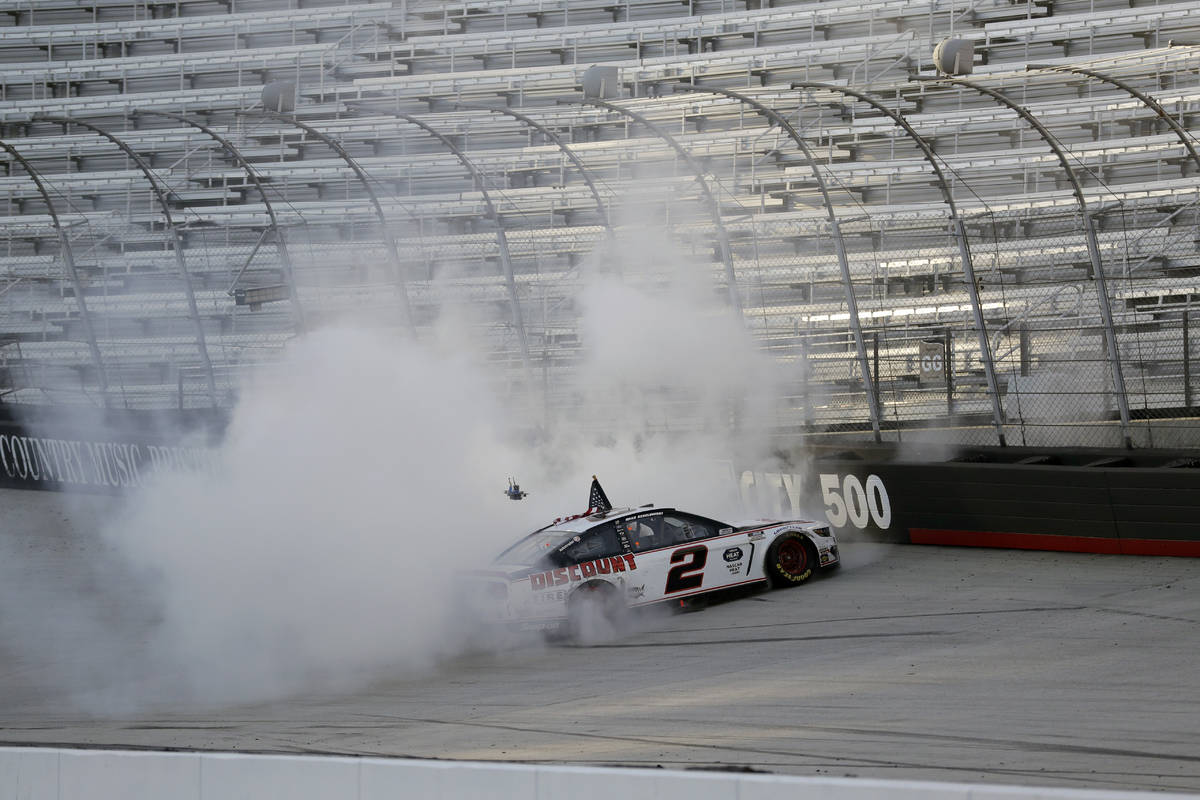 Brad Keselowski (2) does a burnout after winning after winning a NASCAR Cup Series auto race at ...
