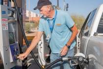 Jim Browning of Pahrump, fills up his gas tank at Sam's Club on East Serene Ave., in Las Vegas ...