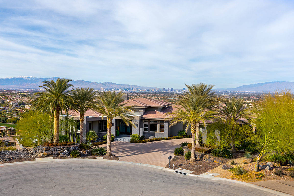 The 7,603-square-foot home at 1508 View Field Court is a hidden gem at MacDonald Highlands. (Iv ...