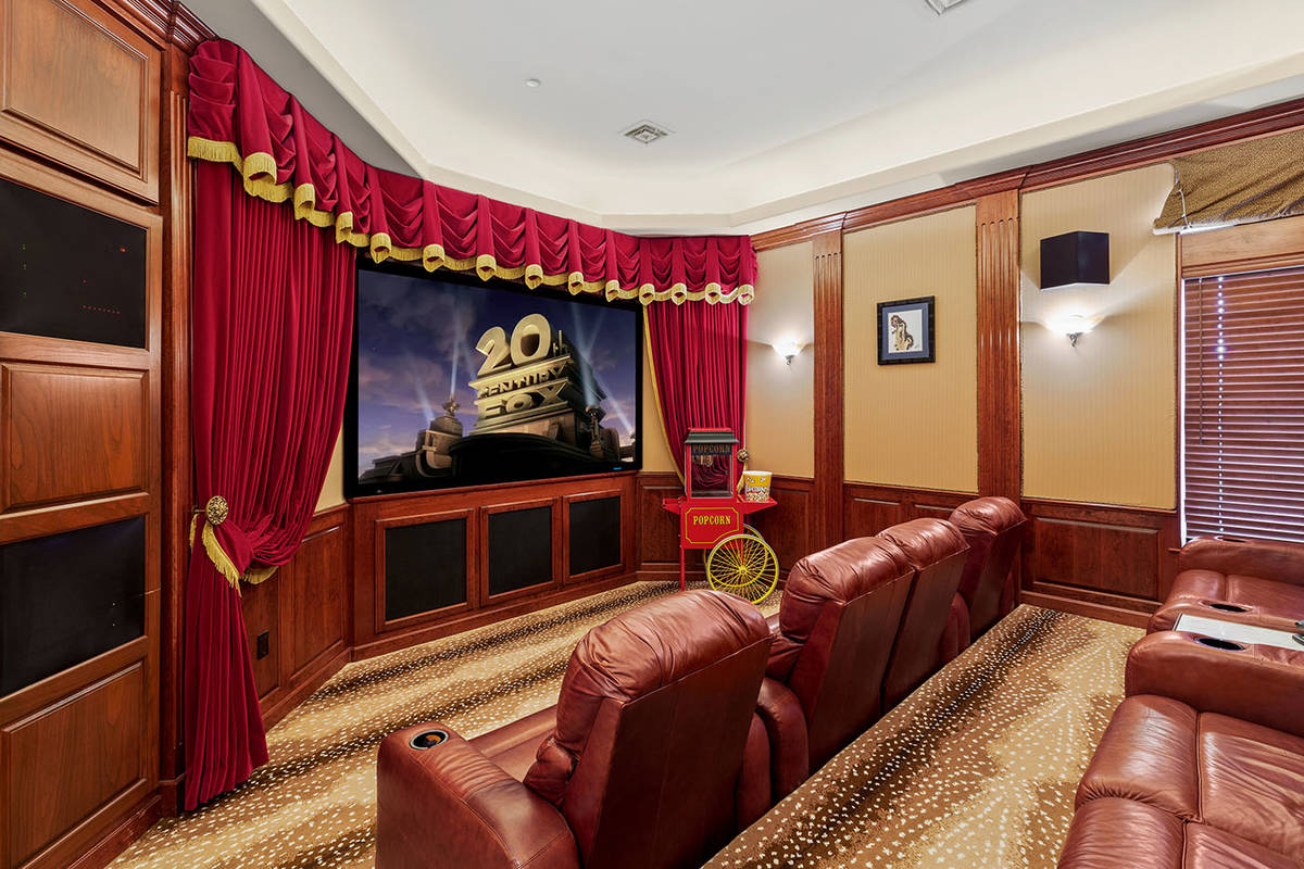 The home at 1508 View Field Court in MacDonald Highlands features a home theater and is listed ...