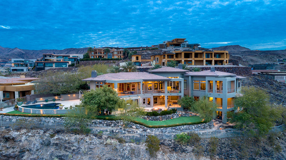 The estate at 1508 View Field Court is perched on a 1-acre hillside in MacDonald Highlands. It ...