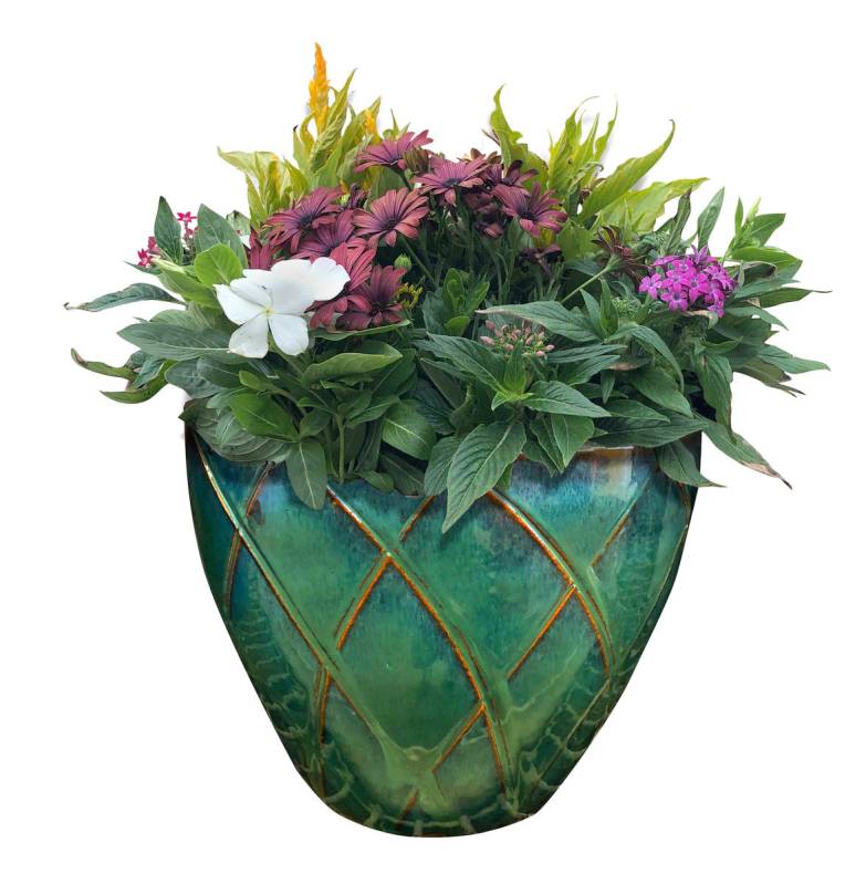 Don't overlook the design appeal that the containers themselves can lend to your landscape. (Ma ...