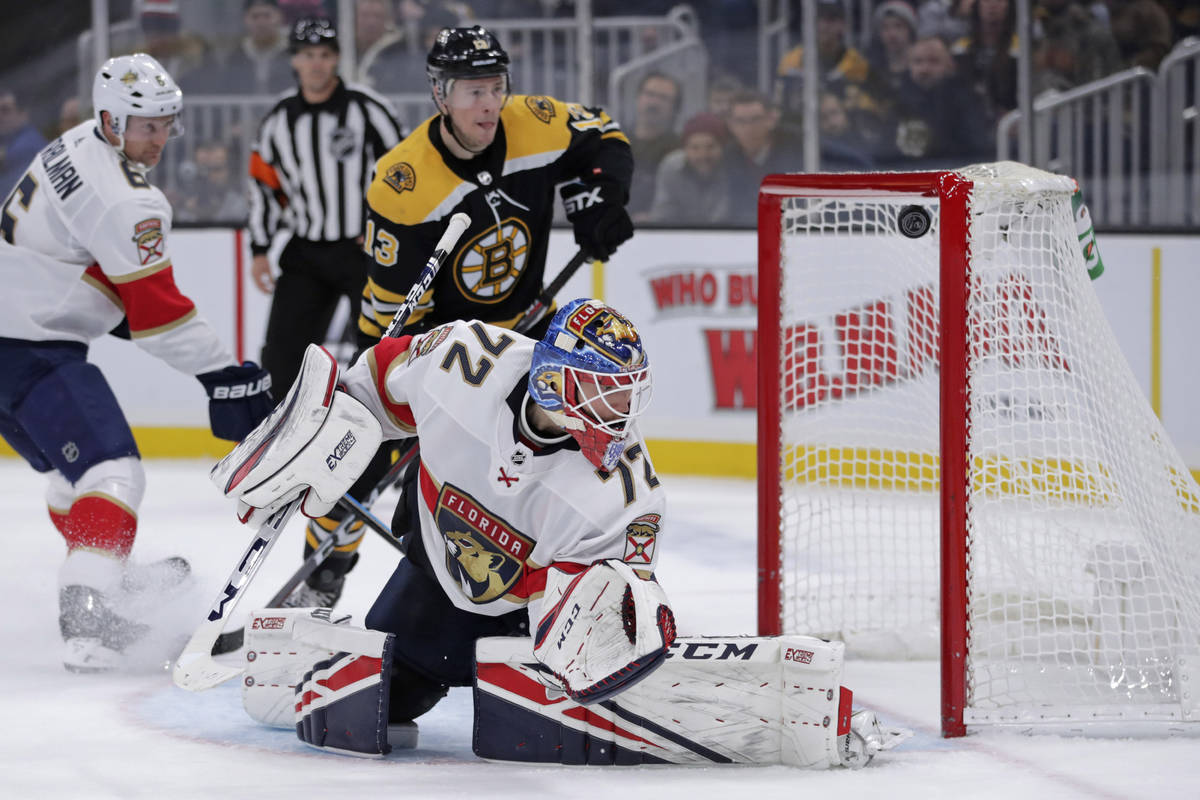 Florida Panthers goaltender Sergei Bobrovsky (72) looks back on a goal by Boston Bruins left wi ...