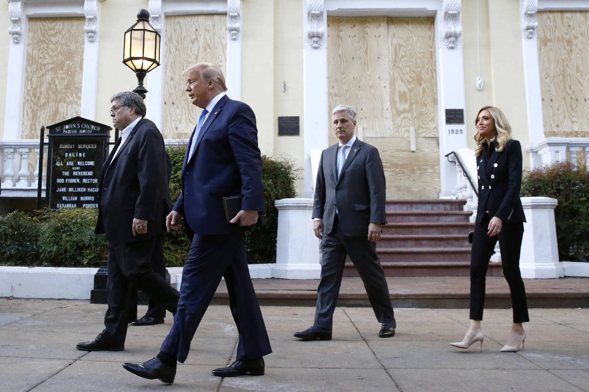 President Donald Trump departs after visiting outside St. John's Church across Lafayette Park f ...