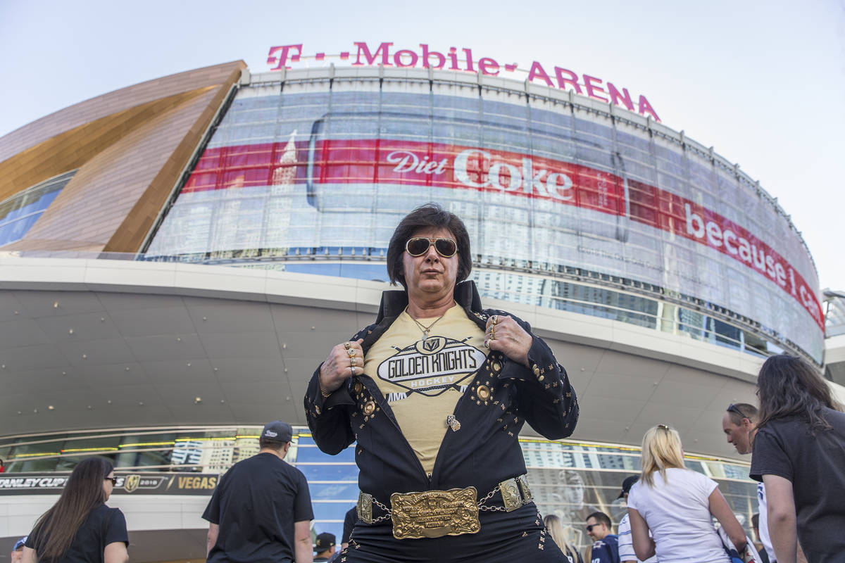 Golden Knights fan and Elvis impersonator Jeff Stanulis outside T-Mobile Arena before the start ...