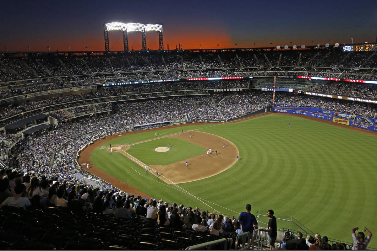 In this Aug. 29, 2019, file photo, the sun sets behind Citi Field during a baseball game betwee ...