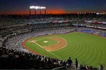 In this Aug. 29, 2019, file photo, the sun sets behind Citi Field during a baseball game betwee ...