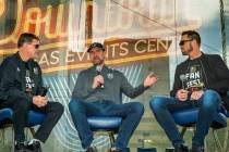 Head coach Peter DeBoer, center, is interviewed by Vegas Golden Knights' sportscasters Dave Gou ...