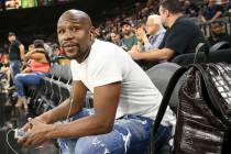 Boxer Floyd Mayweather attends the Las Vegas Aces and Los Angeles Sparks WNBA basketball game a ...