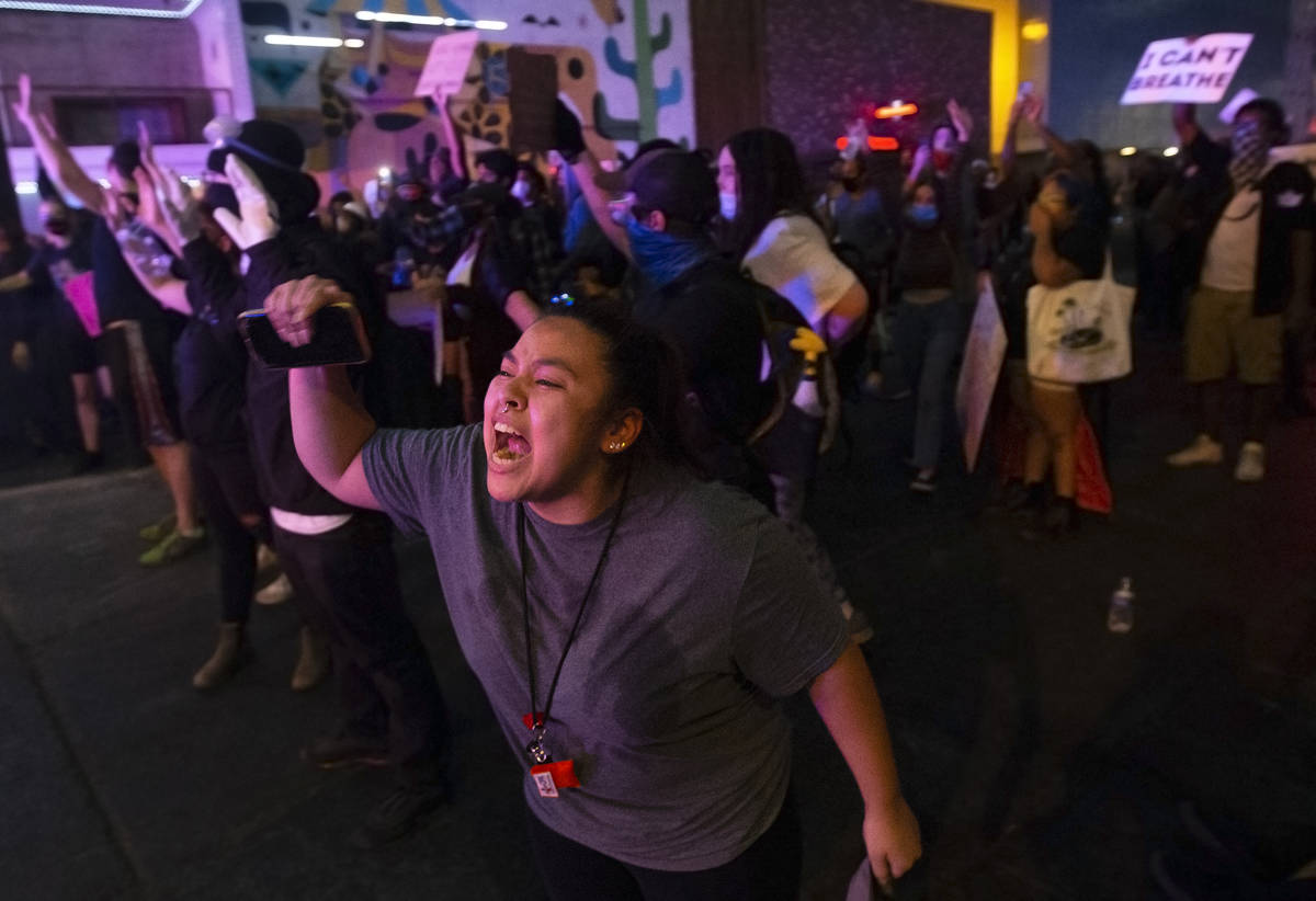 A large crowd organized by Black Lives Matter protests in downtown Las Vegas on Monday, June 1, ...