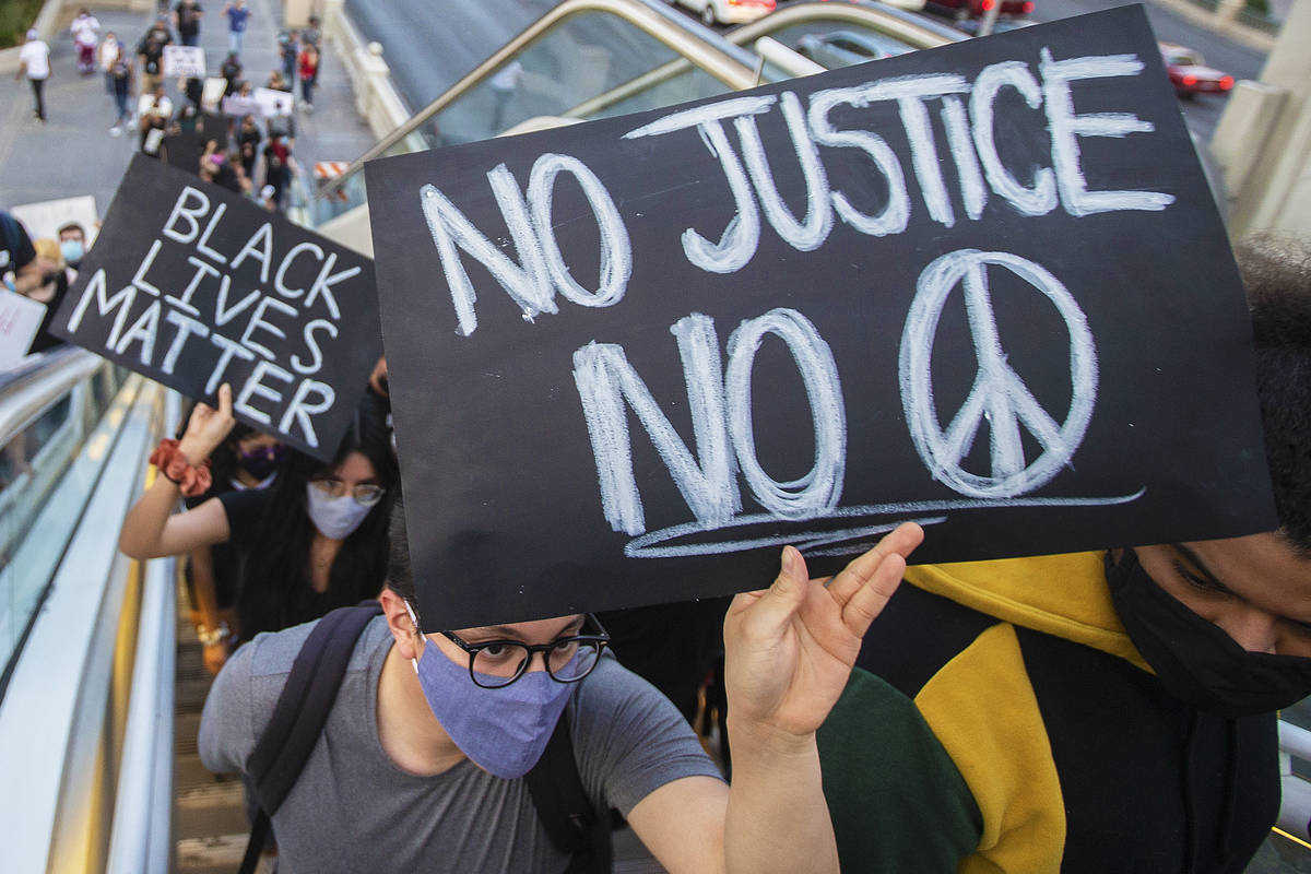 A large crowd protests on the Strip on Monday, June 1, 2020, in Las Vegas as riots continue thr ...