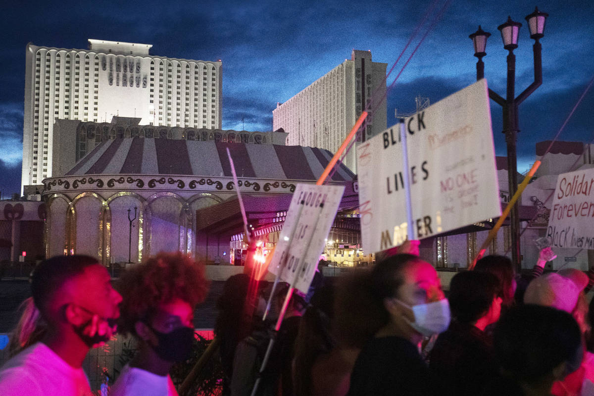 Protestors make way down Las Vegas Boulevard past Circus Circus in support of George Floyd, who ...
