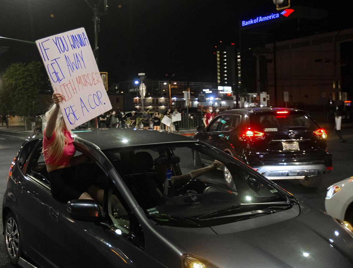 A large crowd organized by Black Lives Matter protests in downtown Las Vegas on Monday, June 1, ...