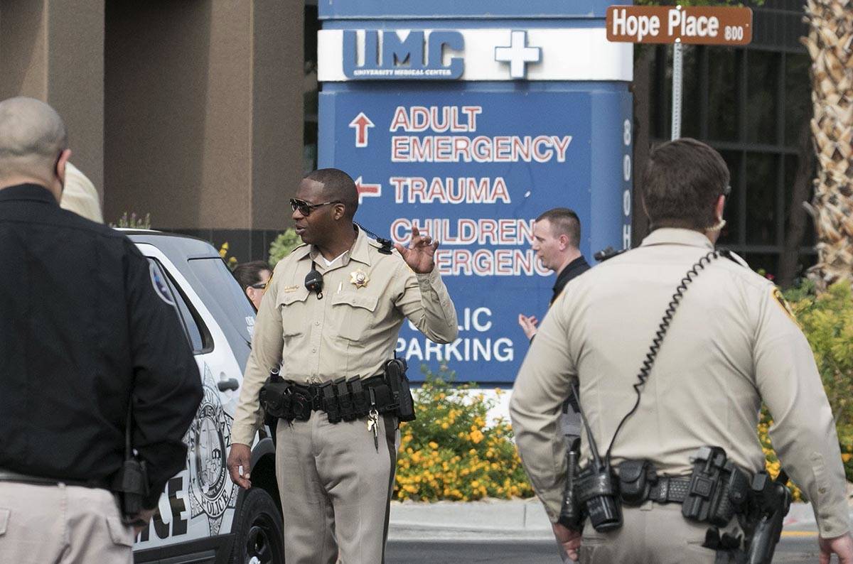 Las Vegas police officers gather outside University Medical Center on Tuesday, June 2, 2020. A ...