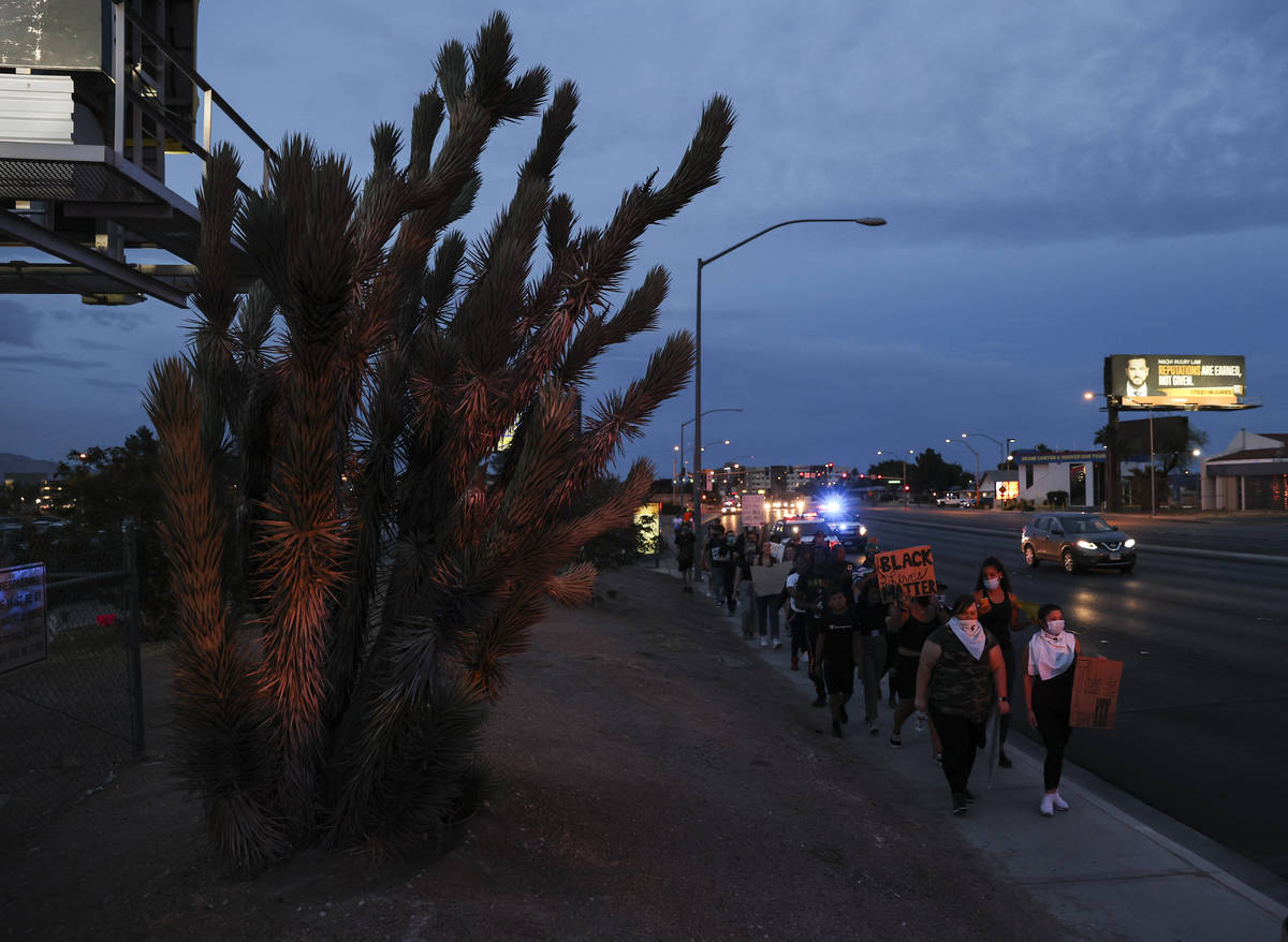 People march during a Black Lives Matter protest near UNLV in Las Vegas on Tuesday, June 2, 202 ...