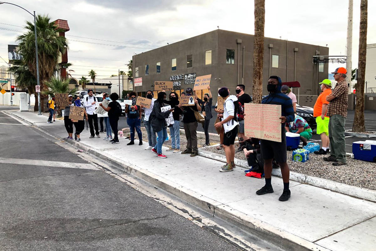 People gather for the Black Lives Matter protest Tuesday, June 2, 2020, at East Naples and Univ ...