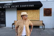 Natalie Young, owner of EAT, at her boarded up restaurant in downtown Las Vegas Tuesday, June 2 ...