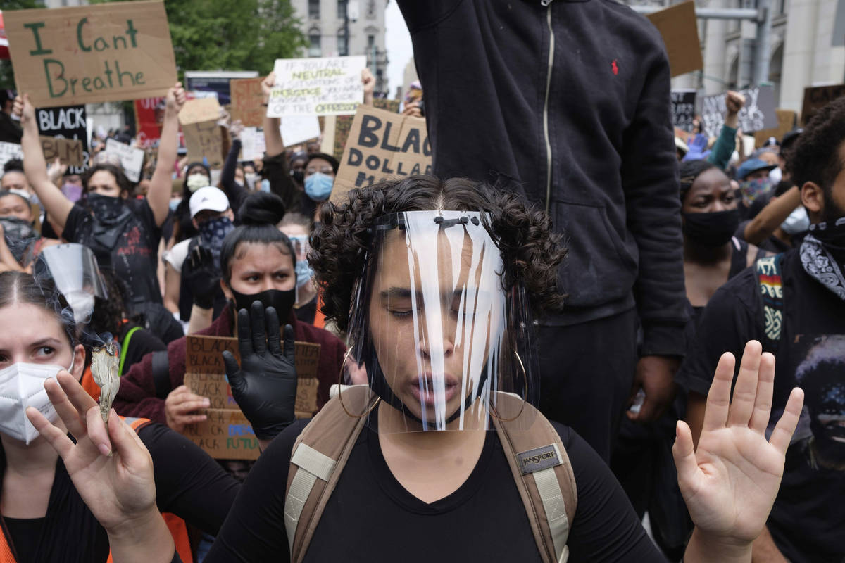 Protesters gather at Foley Square on Tuesday, June 2, 2020, in New York, as part of a demonstra ...