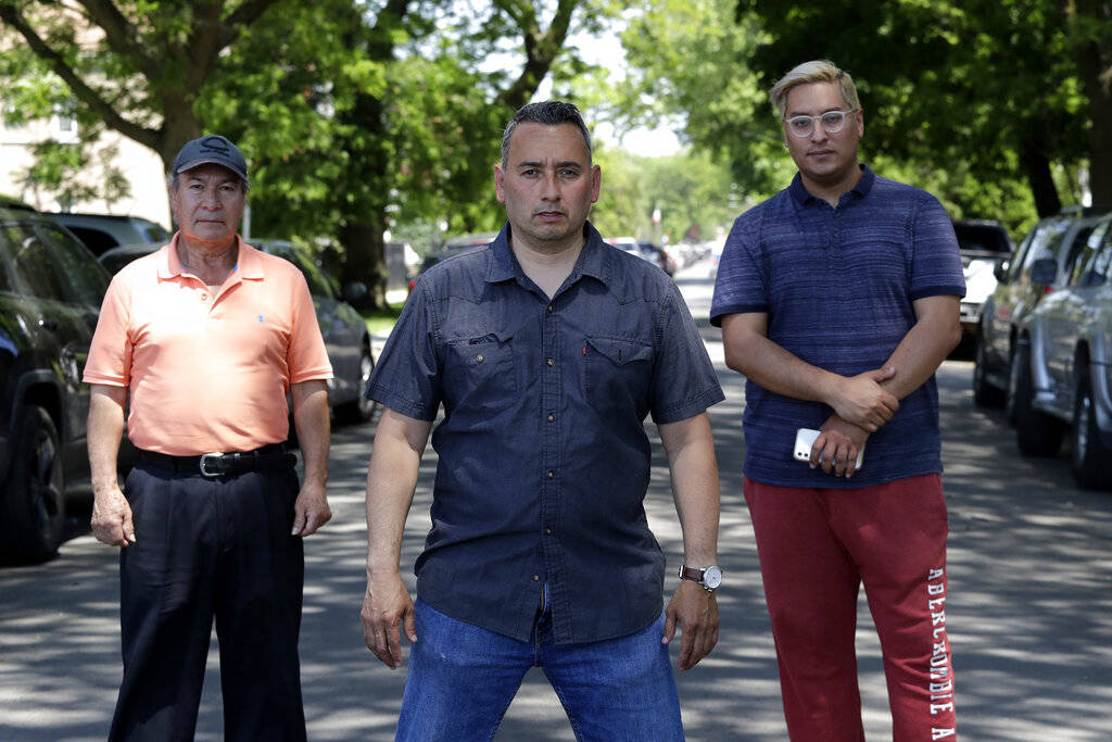 Juan Rodriguez, left, Raul Montes Jr., center, and Radames Pina pose for a photo Tuesday, June ...
