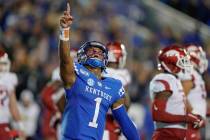 Kentucky quarterback Lynn Bowden Jr. (1) celebrates after throwing a touchdown pass during the ...