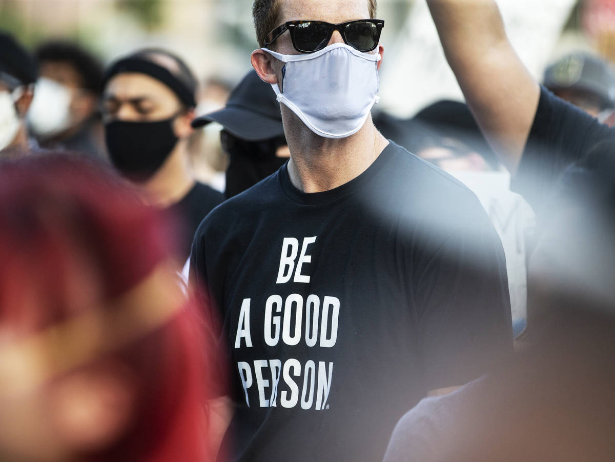 A crowd of at least 300 people protest outside Las Vegas City Hall on Wednesday, June 3, 2020, ...