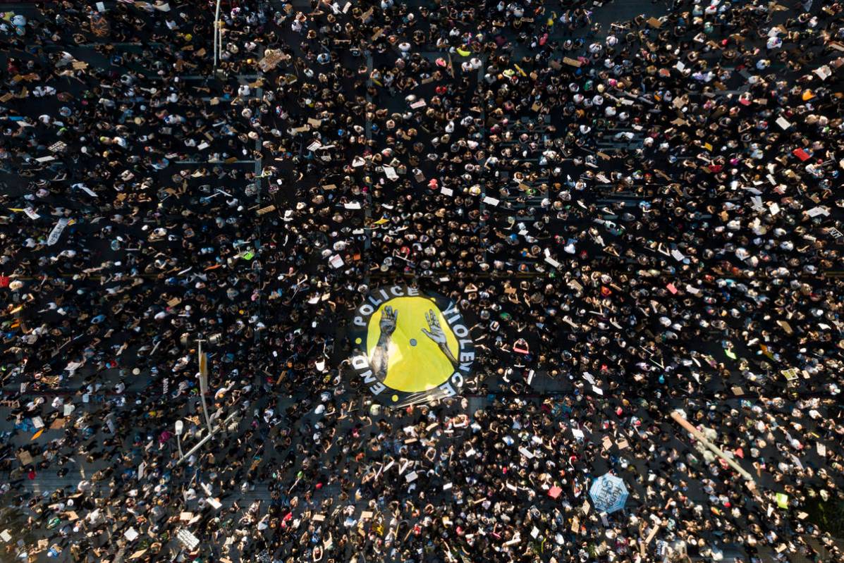 Demonstrators take part in a protest, Wednesday, June 3, 2020, in downtown Los Angeles, sparked ...