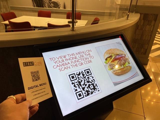 A touchless menu at The Strat Cafe, which was one of the few restaurants open on The Strat's ca ...