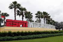 A sign marking the entrance to ESPN's Wide World of Sports at Walt Disney World is seen Wednesd ...